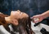 건강한 모발 관리, 생활 속 작은 습관에서 시작하세요 a woman getting her hair washed in a salon