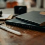 마음 챙기기가 일상이 되는 시대… 정신건강 지키는 생활 습관 제안 a couple of books sitting on top of a wooden table